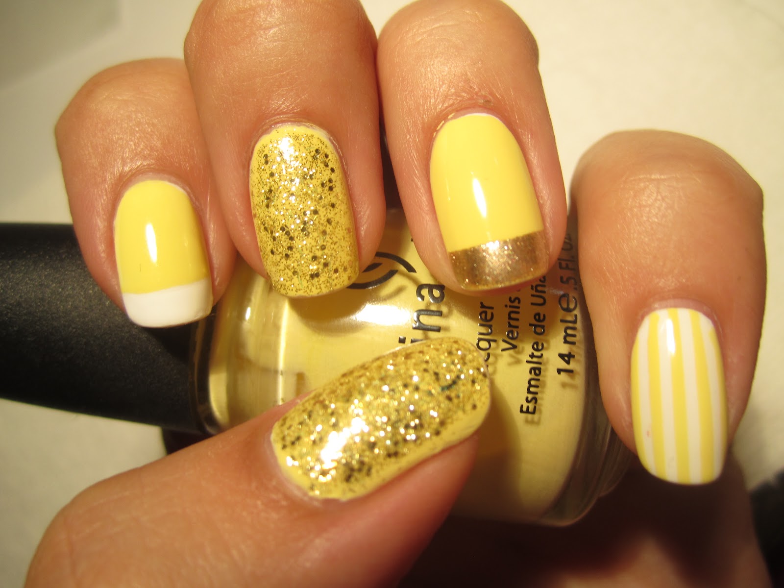 Trendy and Glittering Yellow Nails