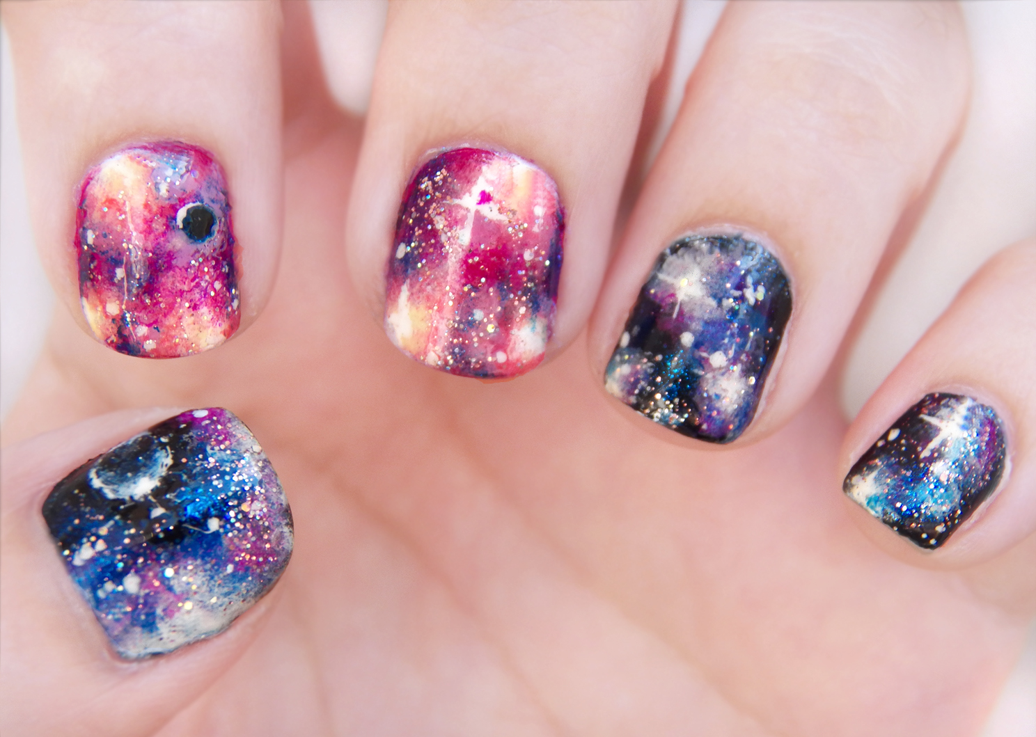 Sophisticated Galaxy Art for Lustrous Nails